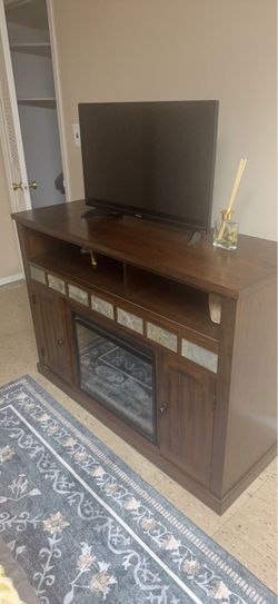 Tv console with working fire place