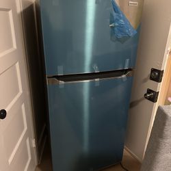 Frigidaire FFTR1835VS 18 Cu. Ft. Garage Ready Top Freezer Refrigerator, Stainless Steel