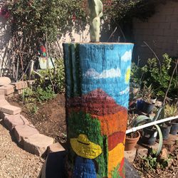 A Tree Trunk as a Planter pot (hand-painted) With A Totem Pole Cactus