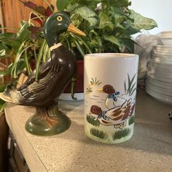 Vintage duck figure with vase