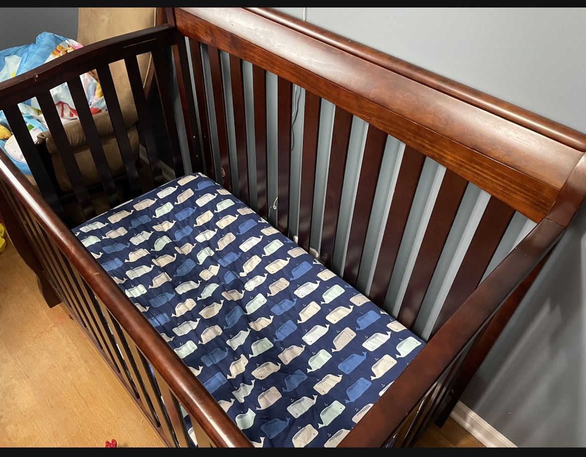 - Baby Crib Turns Into A Full Size Bed And Toddler Bed. Dresser With Six Drawers And Changing Tablee