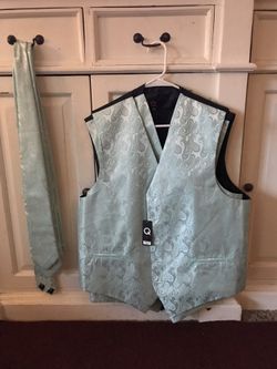 Brand Q 4-vests w/tie and white rose boutonniere