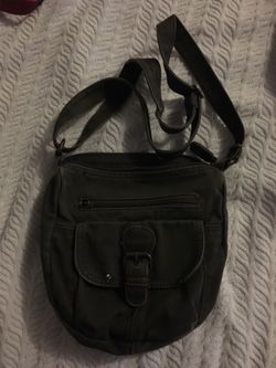 Hunter green small purse can be used as cross body