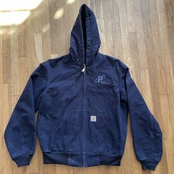Vintage Navy Carhartt J131-DNY zip up jacket.