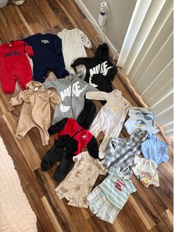 Boys 6–12 month clothing bundle Nike, Disney, and Carter’s