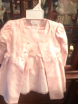 Brand new dresses with tags pink one is size 24monthe & purple one 2 T . $10 per dress