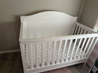 Baby crib with mattress