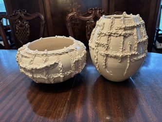 Pair of White Ceramic Vases signed by Argentinian artist. 8” & 5” tall. Located at Coral Gables.