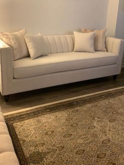 Cream Tufted Sofa with Nailhead Trim