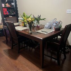 Coffee Brown Rectangular Table With Four Chairs