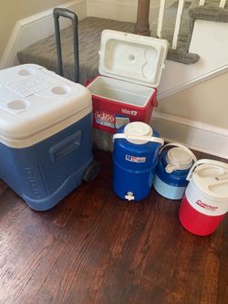 A lot of Coolers Extra Large with Rolling Wheels, Medium and small .