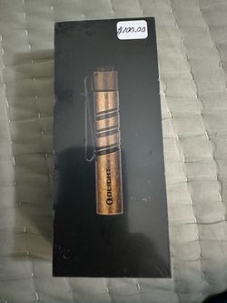 Olight Compact Flashlight in Box