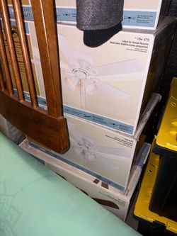 Several brand new white fans