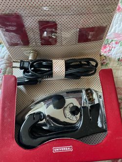 1995 travel iron Red