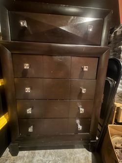 Dark brown wooden dresser