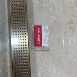 Oatey Designline 24 in. Stainless Steel Linear Shower Drain with Square Pattern Drain Cover in Brushed Gold