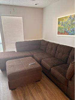 Brown sectional with ottoman