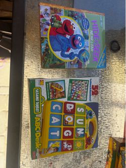 Educational Sesame Street toy set includes a Fisher-Price ABC Desk and a First Look and Find board book.