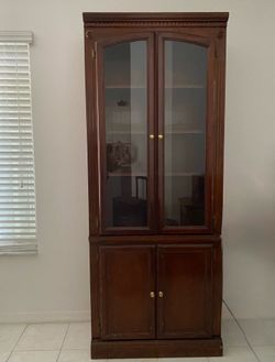 FREE - Storage cabinet with glass door.