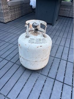 Propane tank with gas