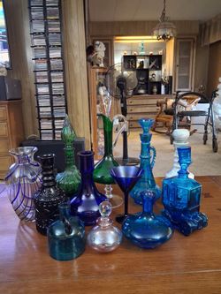 Assorted vintage glassware collection.