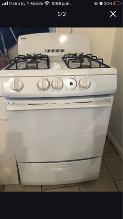 Estufa pequeña 4 quemadores funciona bien  $59