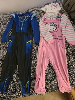 Both suits 4T to 5 T one of them is ,theres two suits on this listing $5 ra