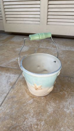 Small ceramic beach themed bathroom trash can