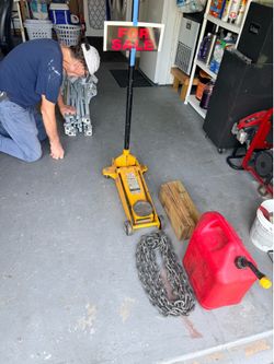 Commercial jack, tow chain and gas can