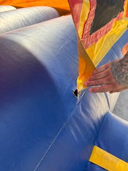 Inflatable Bounce House with Tear Damage