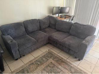 Gray Sectional with sleeper storage and usb