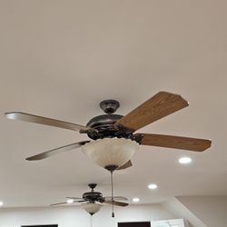 two ceiling fans with lights 