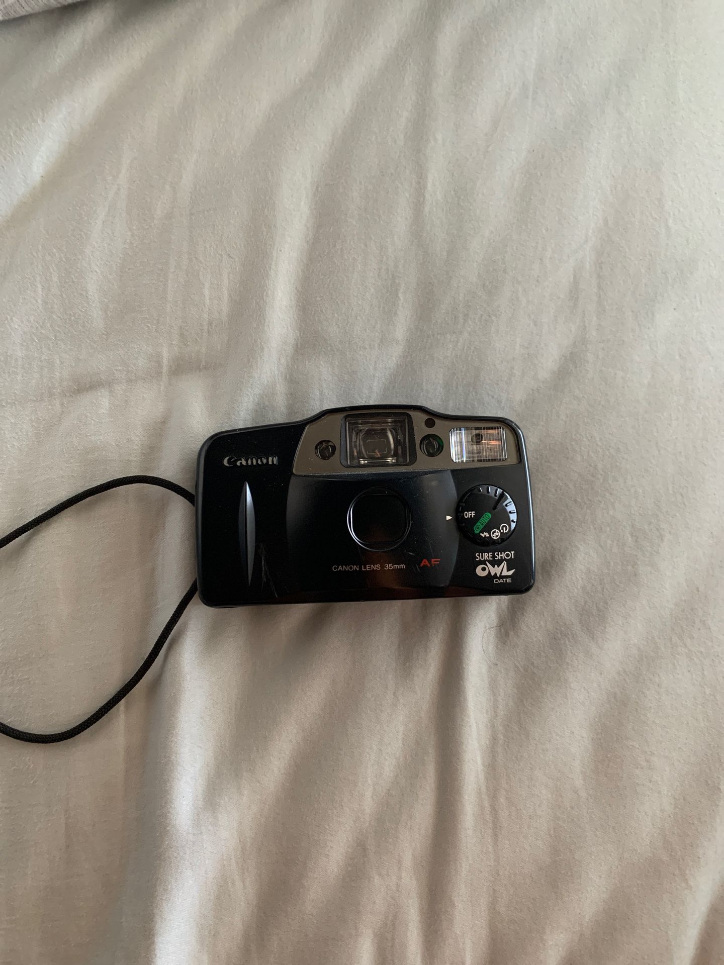 Point and shoot camera canon sure shot owl, film tested