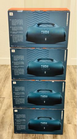 New JBL Boombox 4 speakers. Comes in original packaging. Each speaker has up to 28 hours playtime, plus 6 hours with Playtime Boost. Waterproof and du