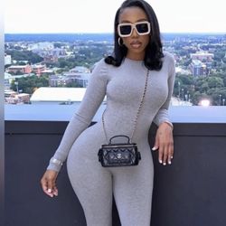 Fashion Nova Gray Sleek Jumpsuit with Minimalist Design