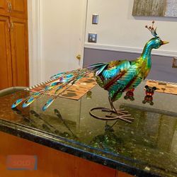 Brand new never used metal peacock with gems for indoor outdoor use