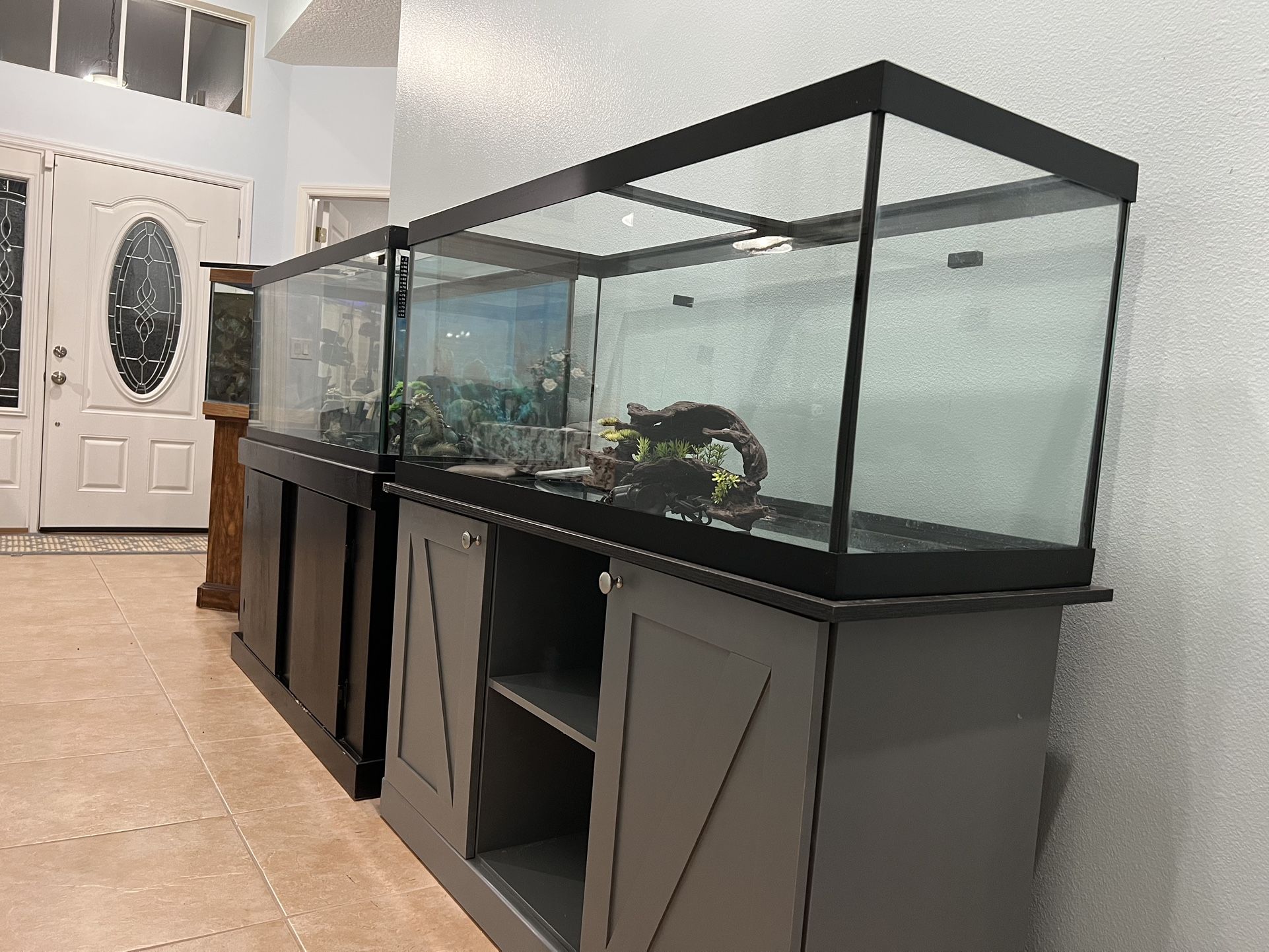 75 Gallons Fish tank,one Black Stand &one blue grey stand.