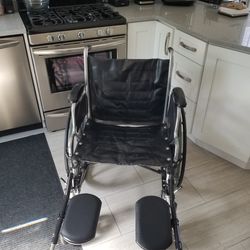 Invacare Tracer EX2 Wheelchair  With Leg Rests With Padded Calf Pads