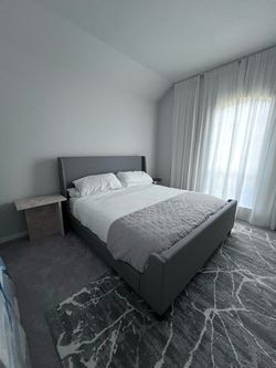 Kind size upholstered bed