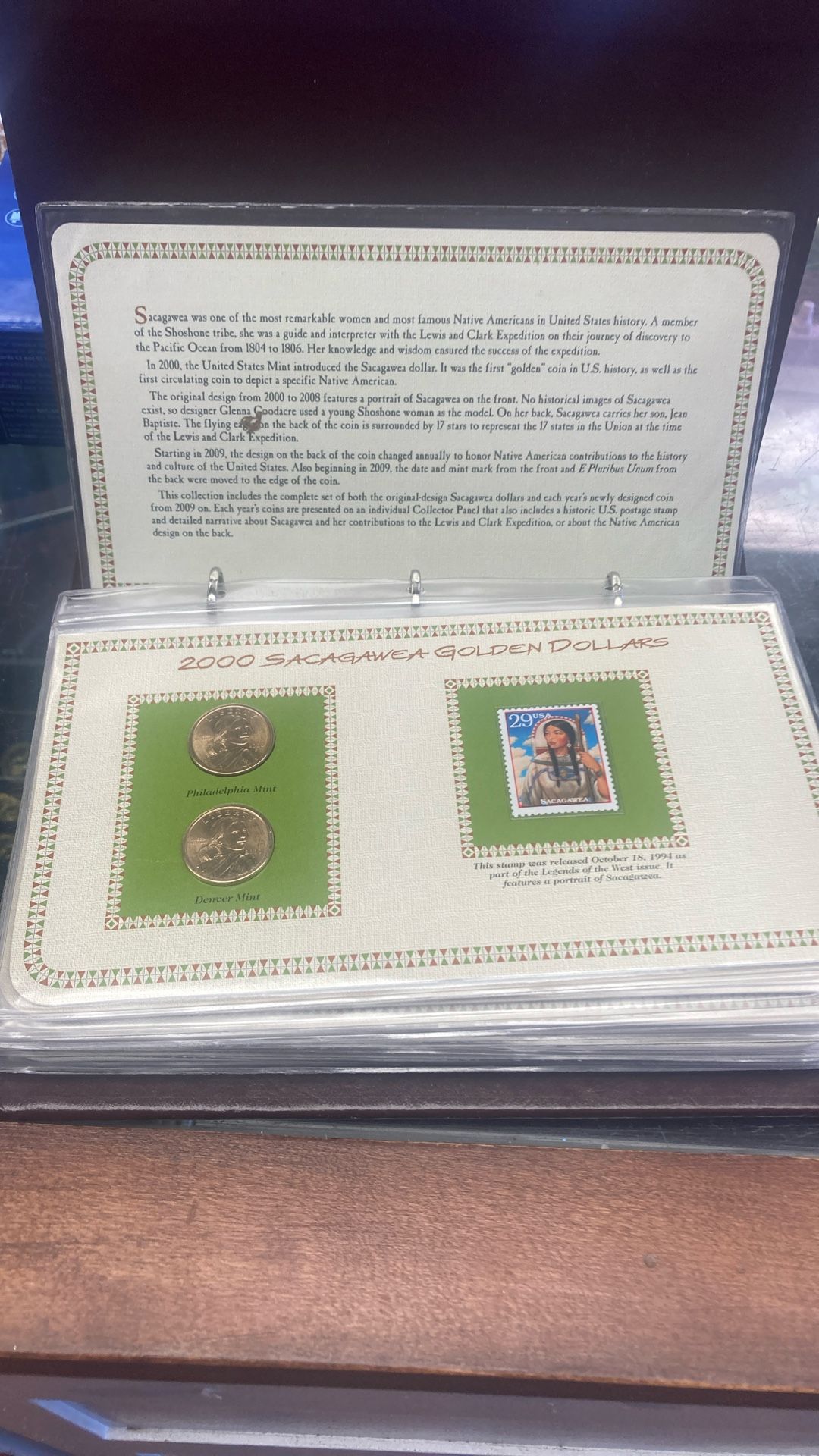 From 2000 to 2013 Saginaw golden dollars in the collection book with the stamps