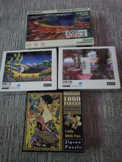 Puzzles lot of 4