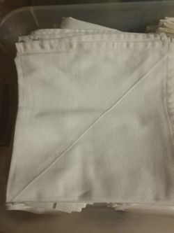 Table cloth 14 of them measurements 52 by 52 napkins 36