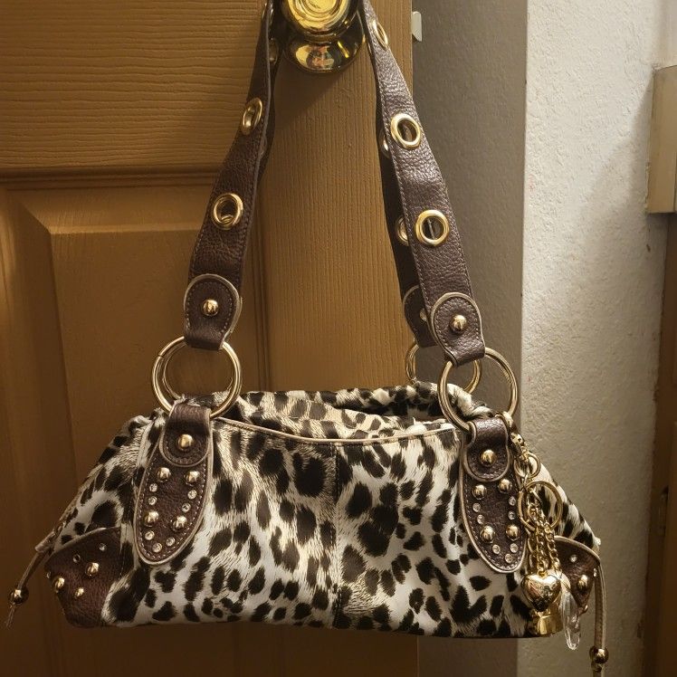 Kathy Van Zeeland Leopard Purse