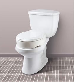 Carex Hinged Round Raised Toilet Seat Riser, Adds 3.5 Inches of Height, 300 lbs Capacity, Elevating and Raising Seat for Elderly and Handicap, Univers