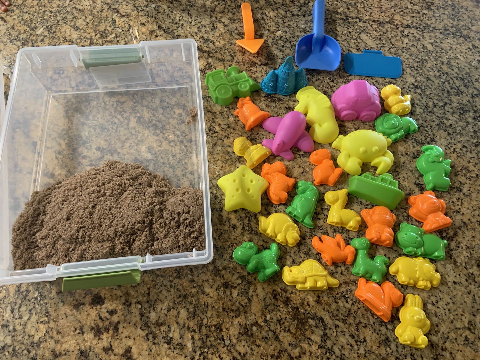 Kinetic sand and molds