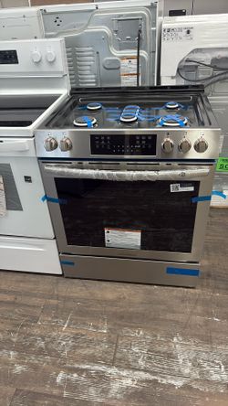 Frigidaire.  Gas Stove And Oven  New L
