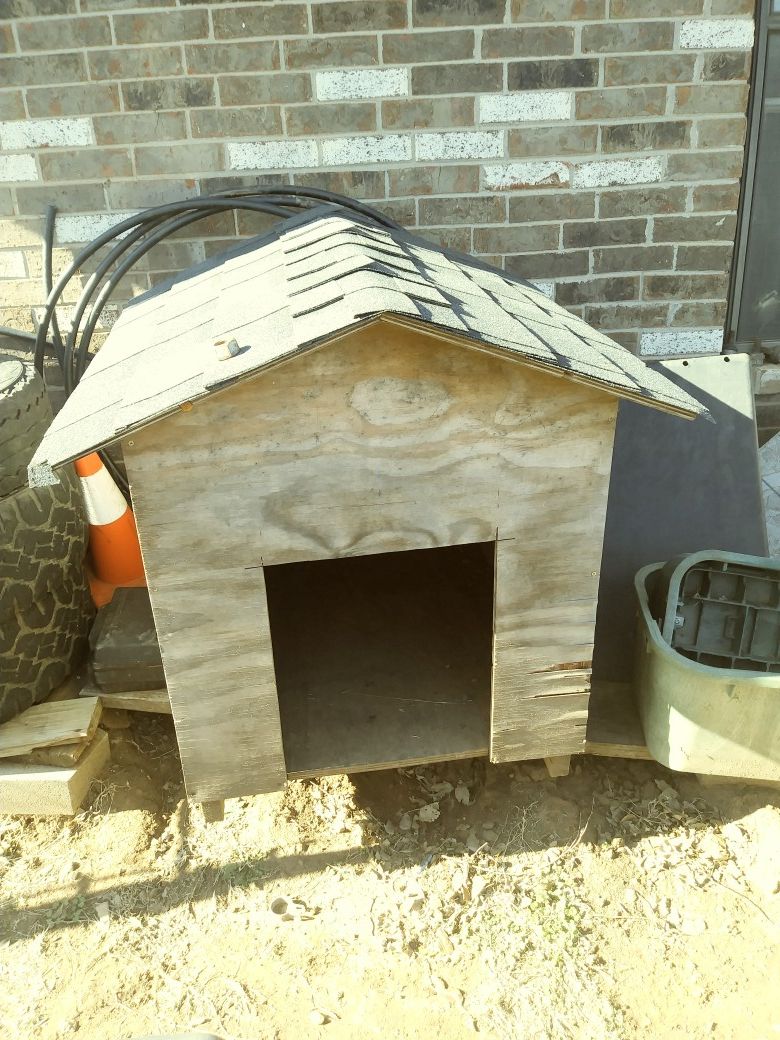 Wood dog house