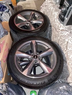 4 Fairly new 18 inch mustang rims and tires