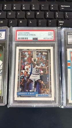 Tiger Woods, Shaq rookie and Dan Marino Graded Cards. Prices In Description