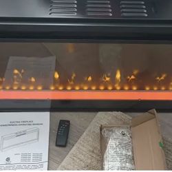 Brand new inbox 42-in electric fireplace insert model number RV42V80L_MT8 comes with crystals and a remote control color changing and temperature sett